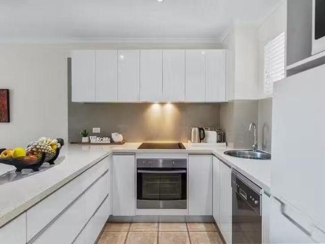408/305 Coral Coast Drive, Palm Cove, QLD 4879