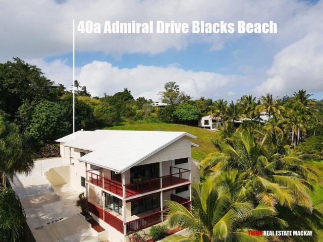 40a, ADMIRAL DRIVE DOLPHIN HEADS. This property is the ultimate in coastal retreats