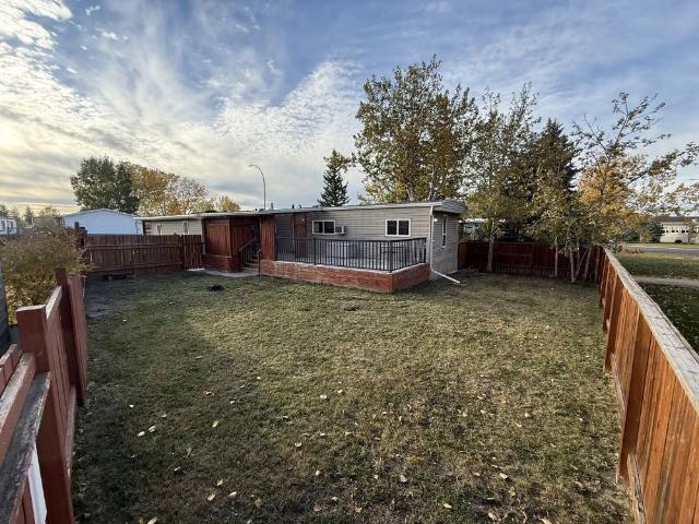 4 Bed, 2 Bath House | Huge Yard & Covered Deck | Near Genesis Place — 4 Bedrooms House