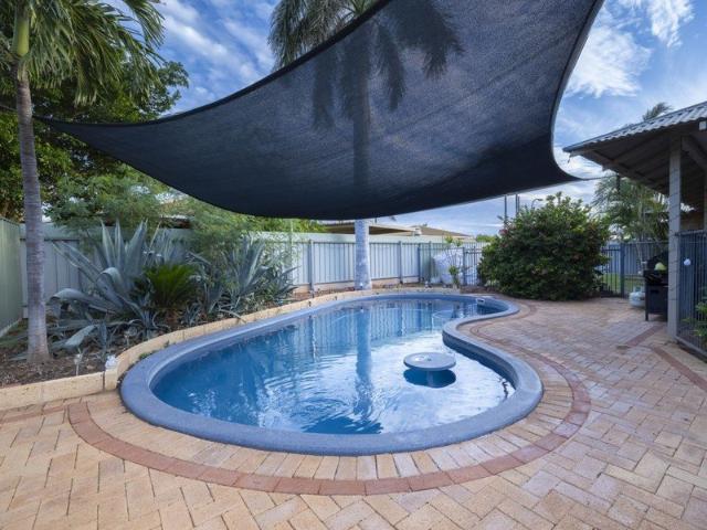 4 BED 2 BATH HOME WITH BELOW GROUND POOL