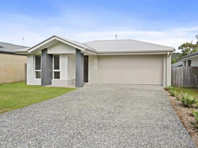 4 BED FAMILY HOME WITH HINTERLAND VIEWS