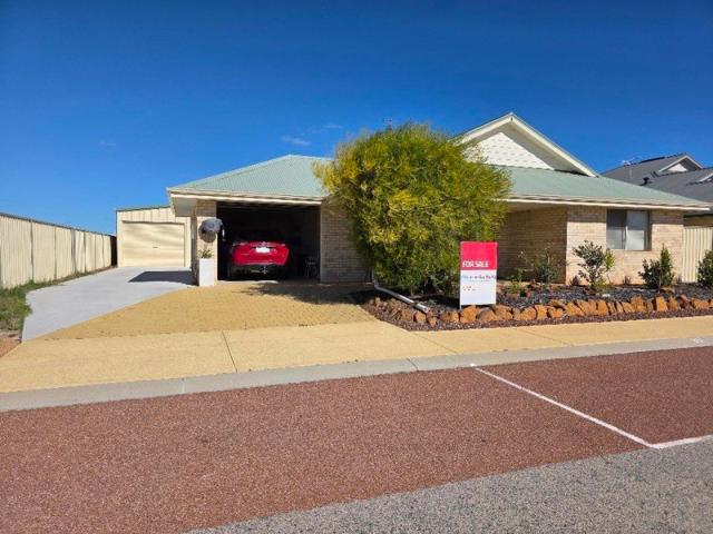 Double brick home with shed