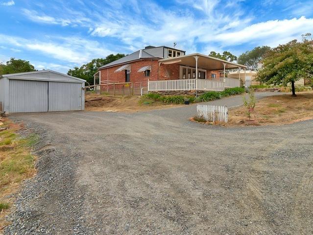4 bedroom Beauty! With Hills Views and Suburban Convenience!