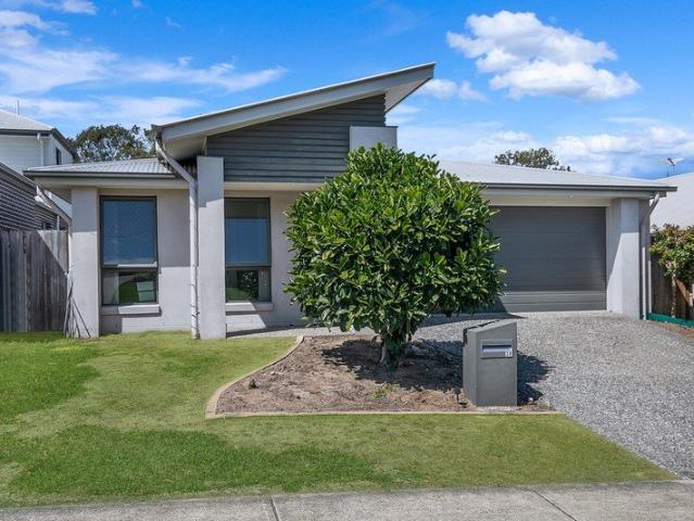 4 Bedroom Family Home With Two Separate Living Areas!