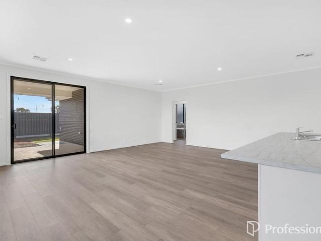 4 Bedroom Home with Multiple Living Areas!