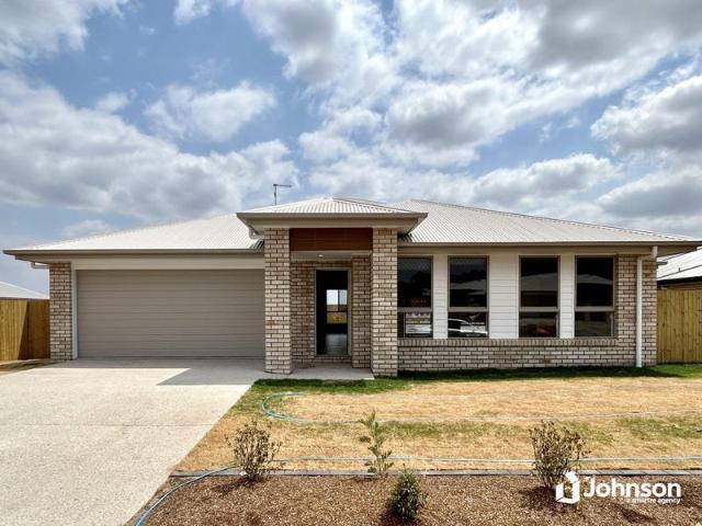 4 Bedroom Home with a Huge Backyard!