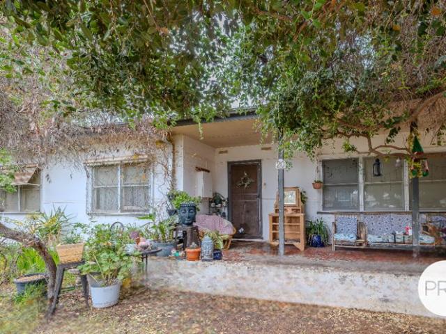 4 BEDROOM HOME WITH REAR LANE ACCESS