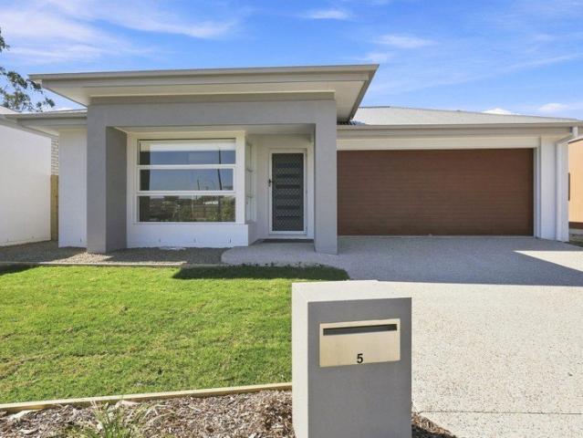 4 Bedroom home in great location Modern and Inviting Living Space!