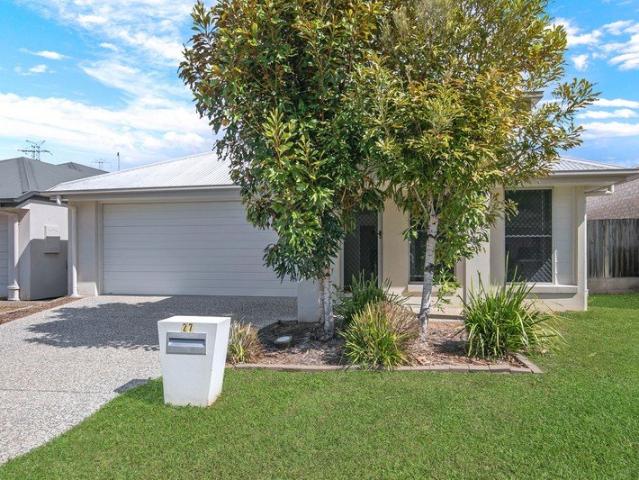 4 Bedroom home, multiple living areas, low maintenance yard!