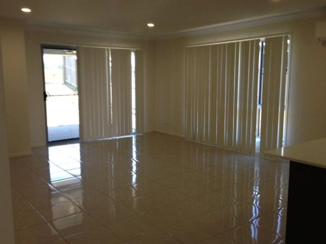 4 Bedroom Lowset Brick Home in Bucasia