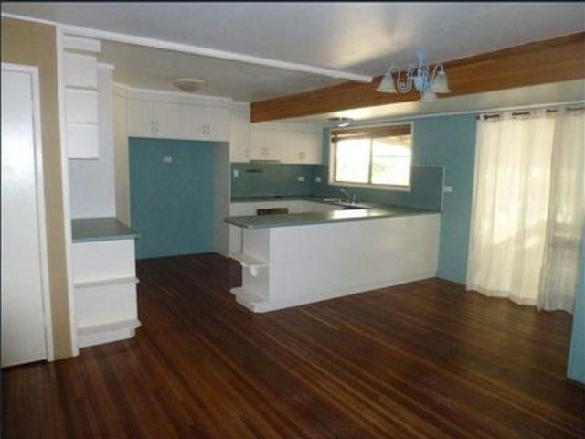 POOLSIDE LIVING IN A SPACIOUS FOUR BEDROOM HOME