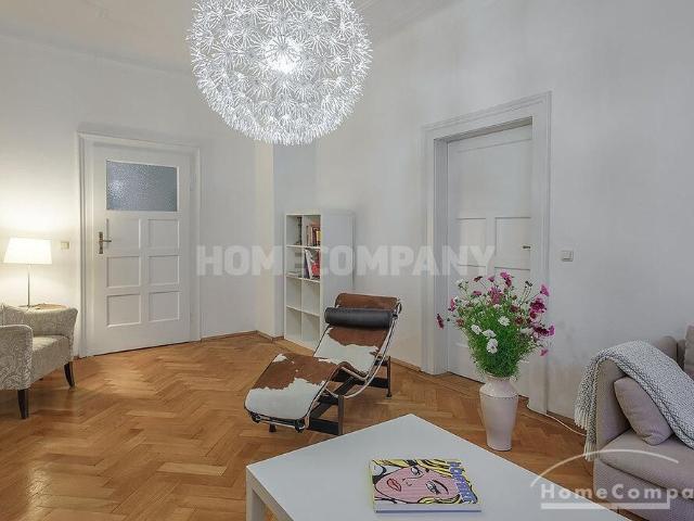 Exclusive 4 room period apartment with balcony & underground parking in a prime location