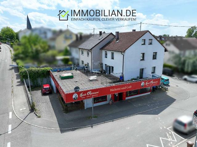 4 Wohnungen und Gewerbe mit Ausbaupotenzial & großer Dachterrasse