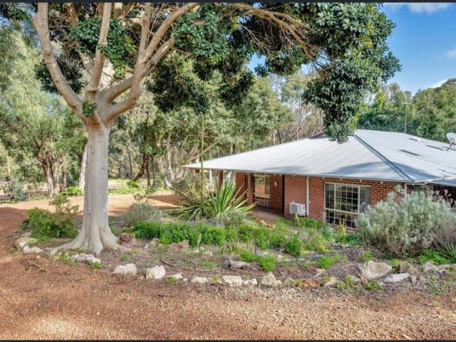 4 x 2 country style home on 8 acres Bring the whole family and your horses! Stables close to house!