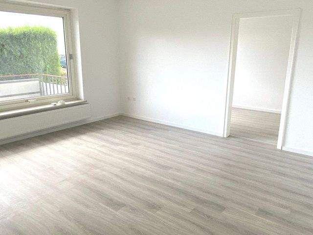4 Zimmer Wohnung mit Balkon im Erdgeschoss