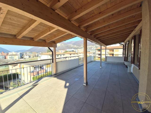 4 ZIMMER APPARTEMENT MIT GROSSER ÜBERDACHTEN TERRASSE IN MENDRISIO