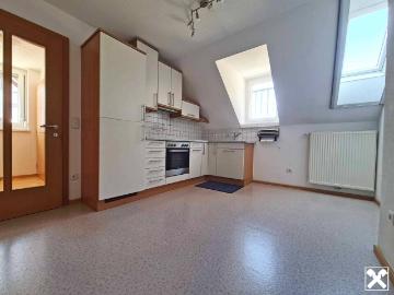 3,5 Zimmer Dachgeschosswohnung mit Gartenanteil in Kennelbach!