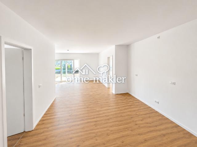 4 Zimmer Erdgeschosswohnung mit Terrasse im Villen Quartier