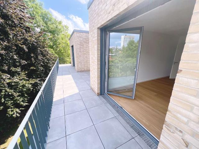 4 Zimmer Penthouse mit 57 m² Dachterrasse & 2 Garagenstellplätzen – sofort bezugsfrei