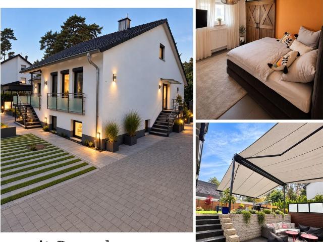 4 Zimmerwohnug mit großer Terrasse, eigenem Hauseingang und Stellplätzen