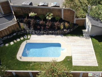 4 1/2 boisé avec piscine à Mont Tremblant Saint Jovite