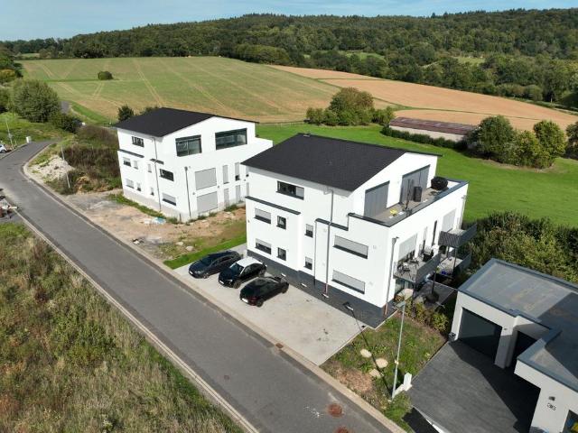 4,5% Rendite Moderne 2 Zimmer Wohnung mit Terrasse in Feldrandlag