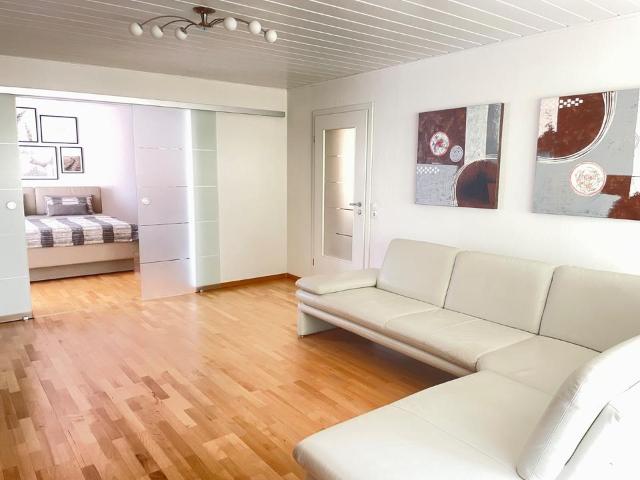 4,5 Zimmer Wohnung 104 m² mit Balkon, TG, Schwimmbad & Sauna