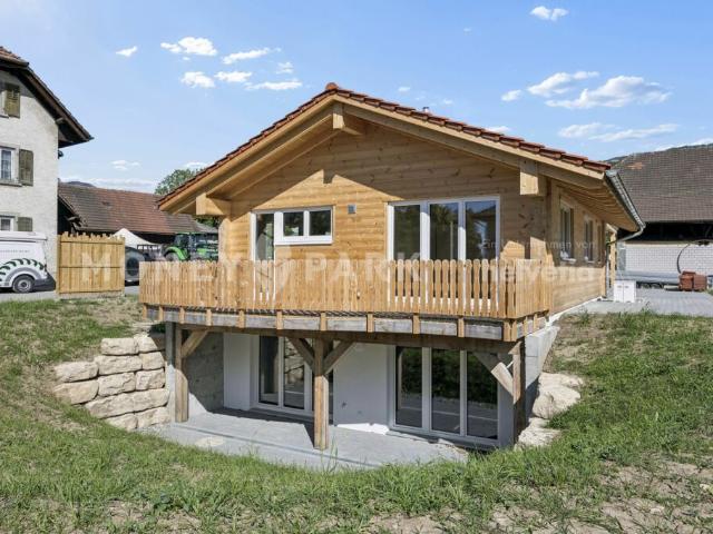 4.5 Zimmer Wohlfühloase: Hochwertiges Holzhaus mit Charakter