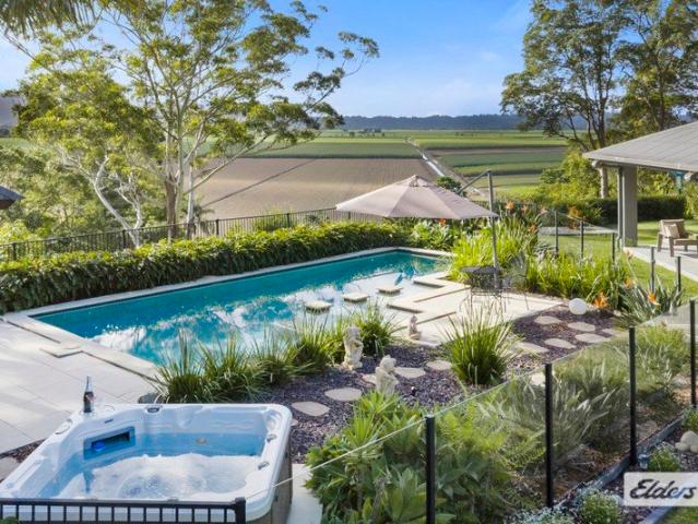 4.9 Acre Hilltop Retreat with Stunning Northern Outlook & Pool Oasis!