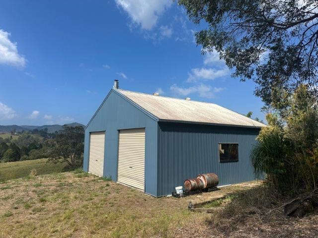 4.9 ACRES CREEK PASSING THROUGH AND A COLOURBOND SHED