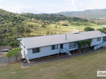 50 Acres of Scenic Country Living with Stunning Valley Views