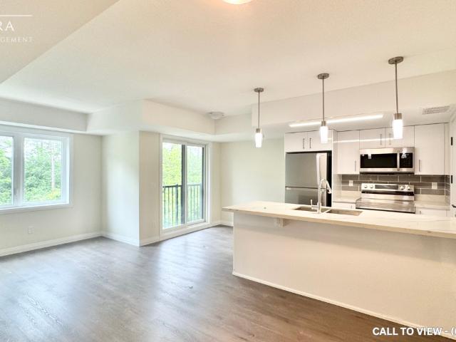 50C 370 Fisher Mills Rd, Cambridge, Ontario N3C 4N5 BEAUTIFUL 2 BEDROOM FREEHOLD TOWNHOUSE WITH MODERN UPGRADES Townhome for Rent