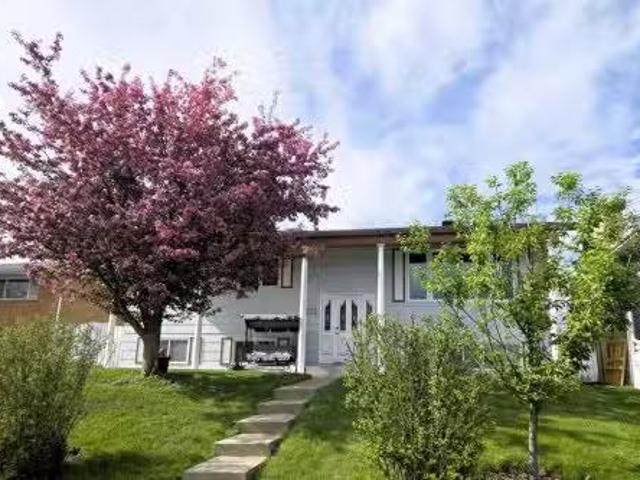 512 Hunterplain Hill Nw, Calgary, AB, T2K 4L7 house for sale.