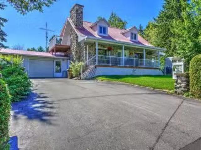 52 Ch. Charbonneau, Saint Donat, QC, J0T 2C0 house for sale.
