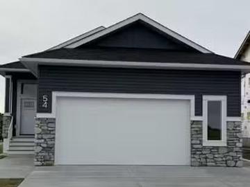 House for sale in Olds, Alberta - Garden