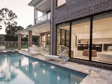 55 Square Fowler Built Home Only 2 Years Old with Luxurious Pool and Spa side Living in Box Hills Most Exclusive Street