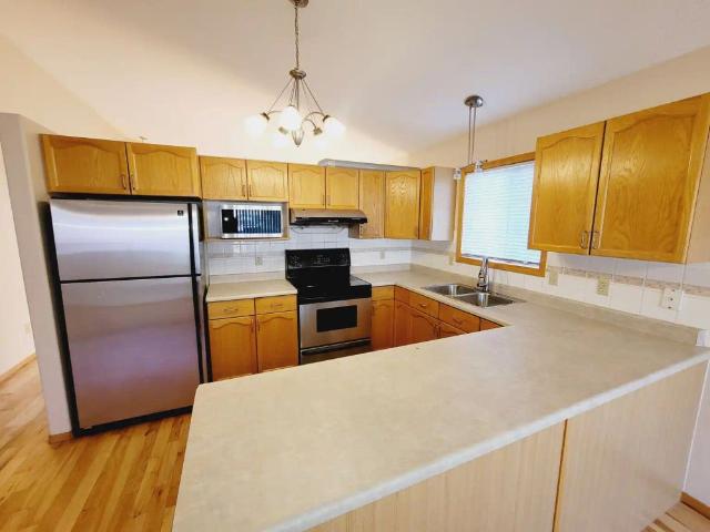 568 Glenwright Crescent NW — Single Family Home