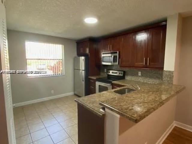 5841 Riverside Dr, Unit 106A3, Coral Springs, FL 33067 | MLS #A11952