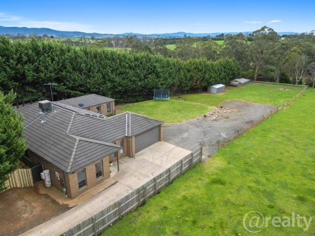 5 bedroom, 3 bath, 3 living on over an acre!