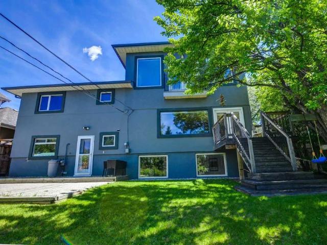 5 bedroom 3 bathroom Inner City Beauty Gorgeous Views and Beautiful Lot — 5 Bedrooms+ Den House