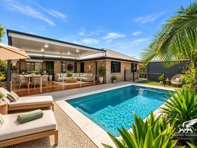 5 Bedrooms, Butler's Pantry, Multiple Living Areas, Study, Pool. And More!