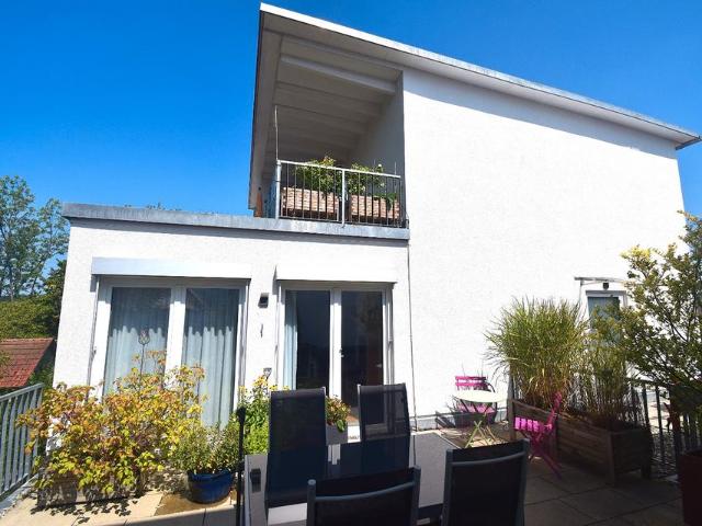 5 Zimmer Wohnung mit Haus Charakter, Garage und Stellplatz