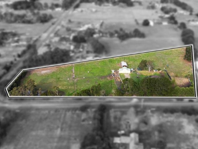 5.5 Acres + 4 bed home