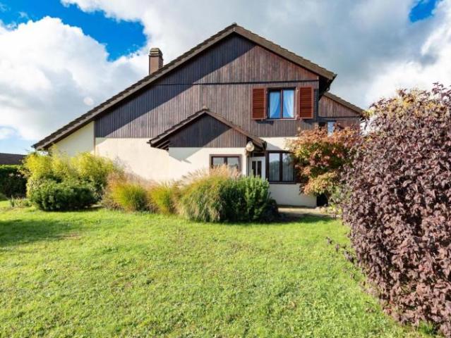5.5 Zimmer Doppelhaushälfte mit wunderschön angelegtem Garten