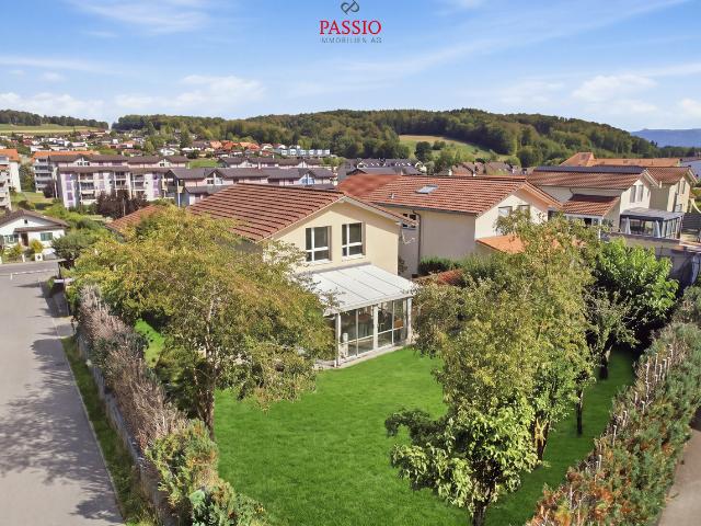 5.5 Zimmer Familienhaus mit Wintergarten und Gartenidylle