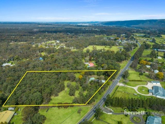 5.75 LEVEL ACRES COMFORTABLE COTTAGE BUILD YOUR DREAM HOME!