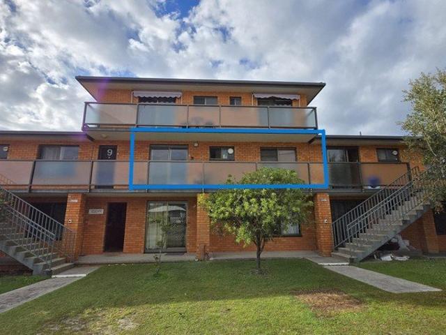 Walk to Everything from Cameo Court Large Furnished Two Bedroom Coastal Apartment with Balcony, Garage & Pool!