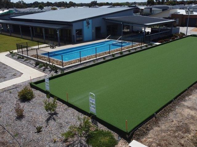 668 m2 fully fenced block in gated over 50's village with FREEHOLD TITLE