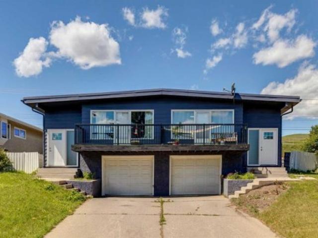 6717 6 Huntsbay Road Nw, Calgary, AB, T2K 4R2 house for sale | Listing ID A2328 | Royal LePage