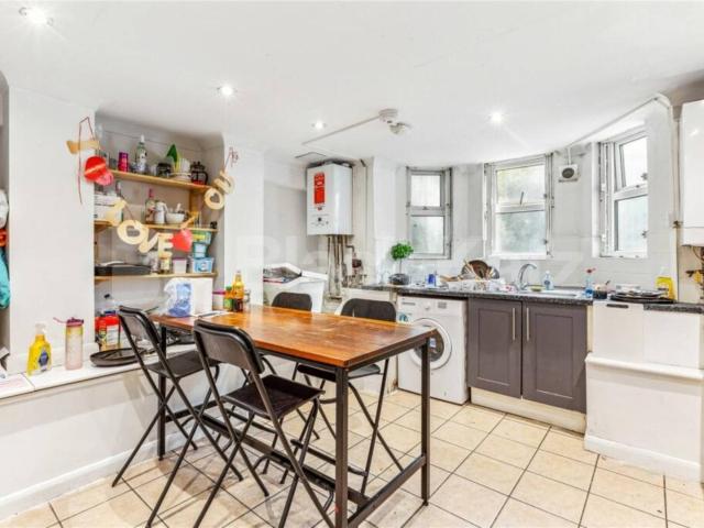 6 bedroom house with 2 reception rooms and a rear garden